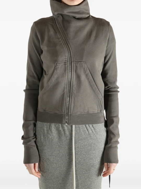 Grey sweat worn by a person, showing the sweat fit