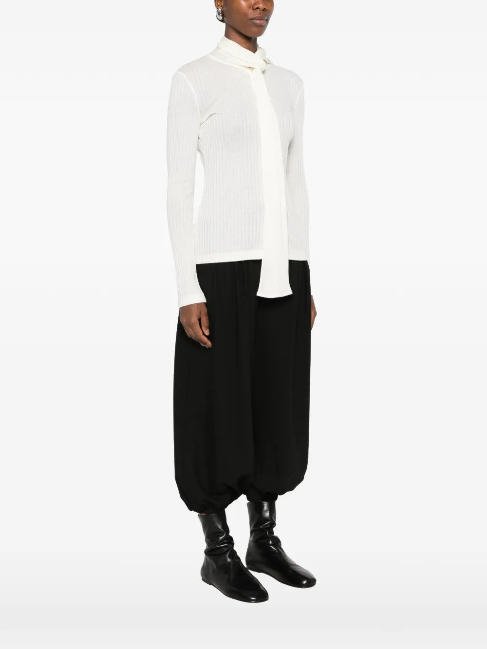 White top, full body view