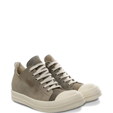 Tan sneakers, side view