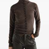 Brown top worn by a person, showing the top fit