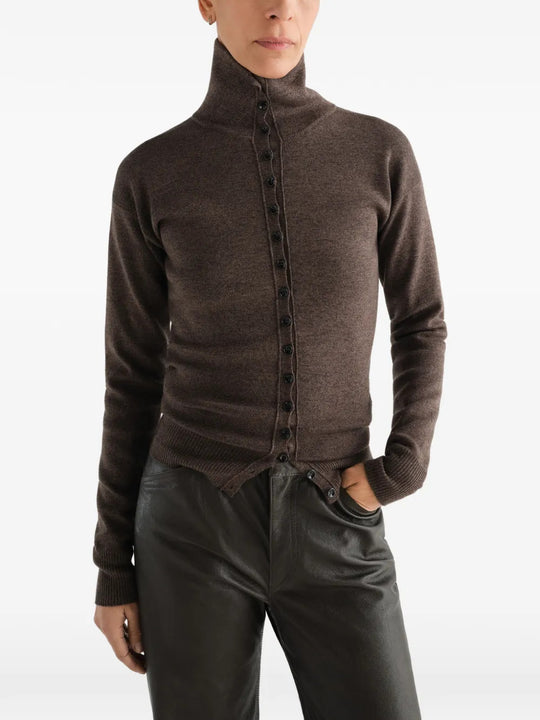 Brown top worn by a person, showing the top fit