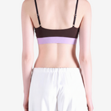 Purple activewear worn by a person, showing the activewear fit