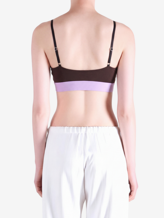 Purple activewear worn by a person, showing the activewear fit