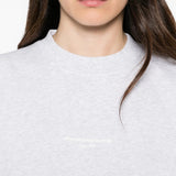 Grey t-shirt worn by a person, showing the t-shirt fit