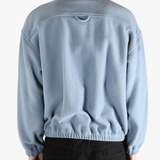 Blue hoodie worn by a person, showing the hoodie 's fit