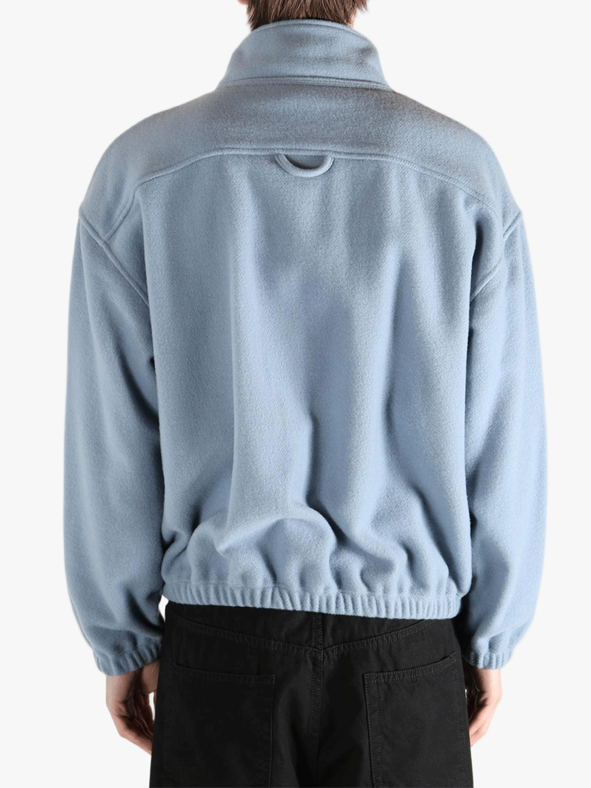 Blue hoodie worn by a person, showing the hoodie 's fit