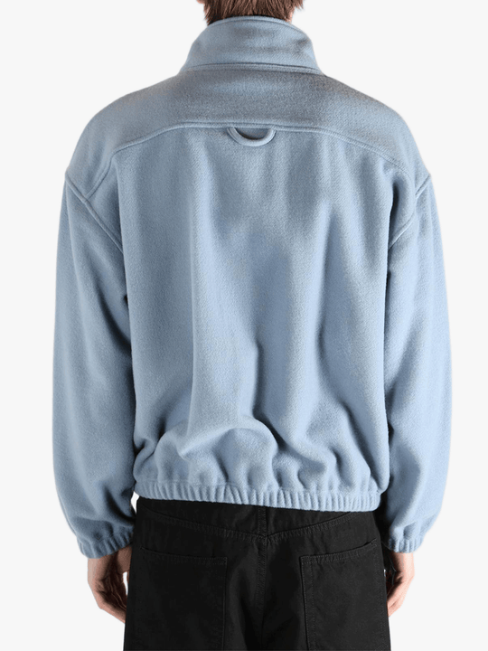 Blue hoodie worn by a person, showing the hoodie 's fit