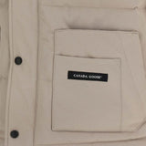 Close up of Tan jacket, showing texture of the 84% polyester/ 16% cotton fabric