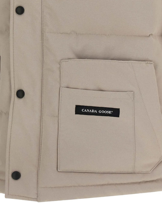 Close up of Tan jacket, showing texture of the 84% polyester/ 16% cotton fabric