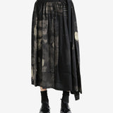 Black skirt worn by a person, showing the skirt fit