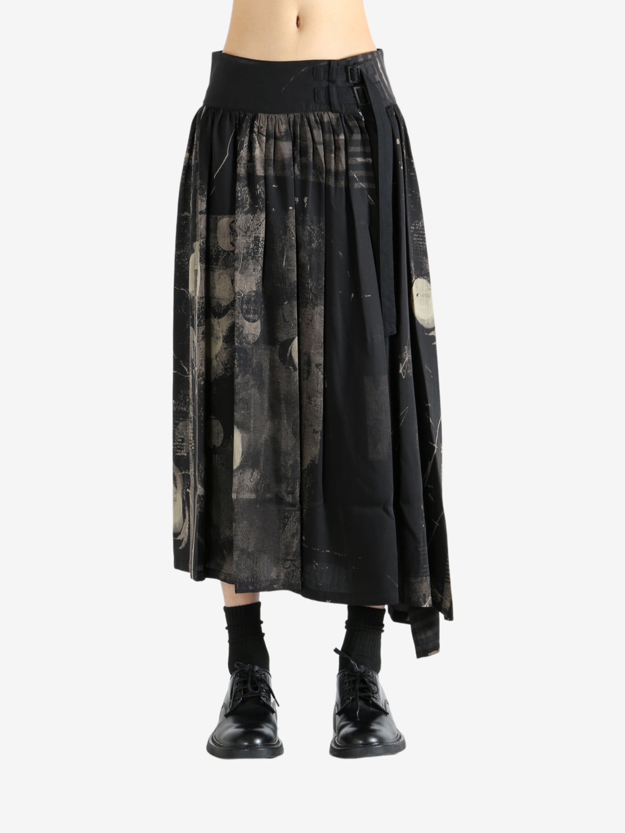 Black skirt worn by a person, showing the skirt fit