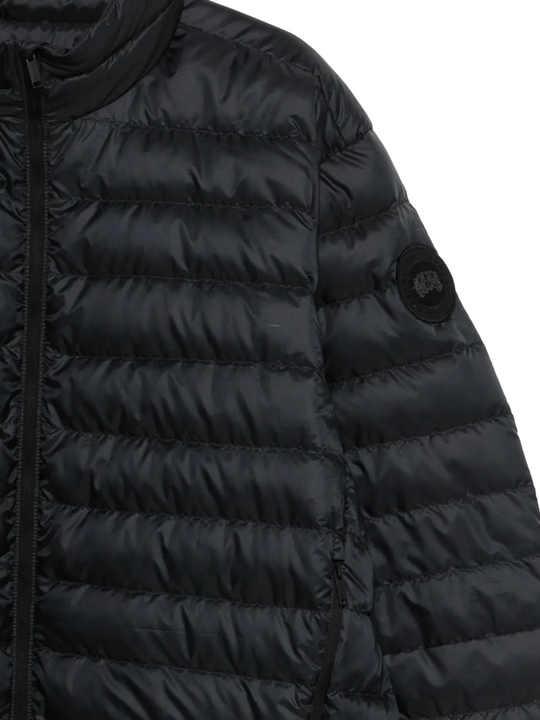 Close up of black jacket, showing texture of the Polyamide fabric