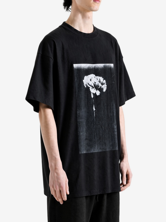Black t-shirt worn by a person, showing the t-shirt fit