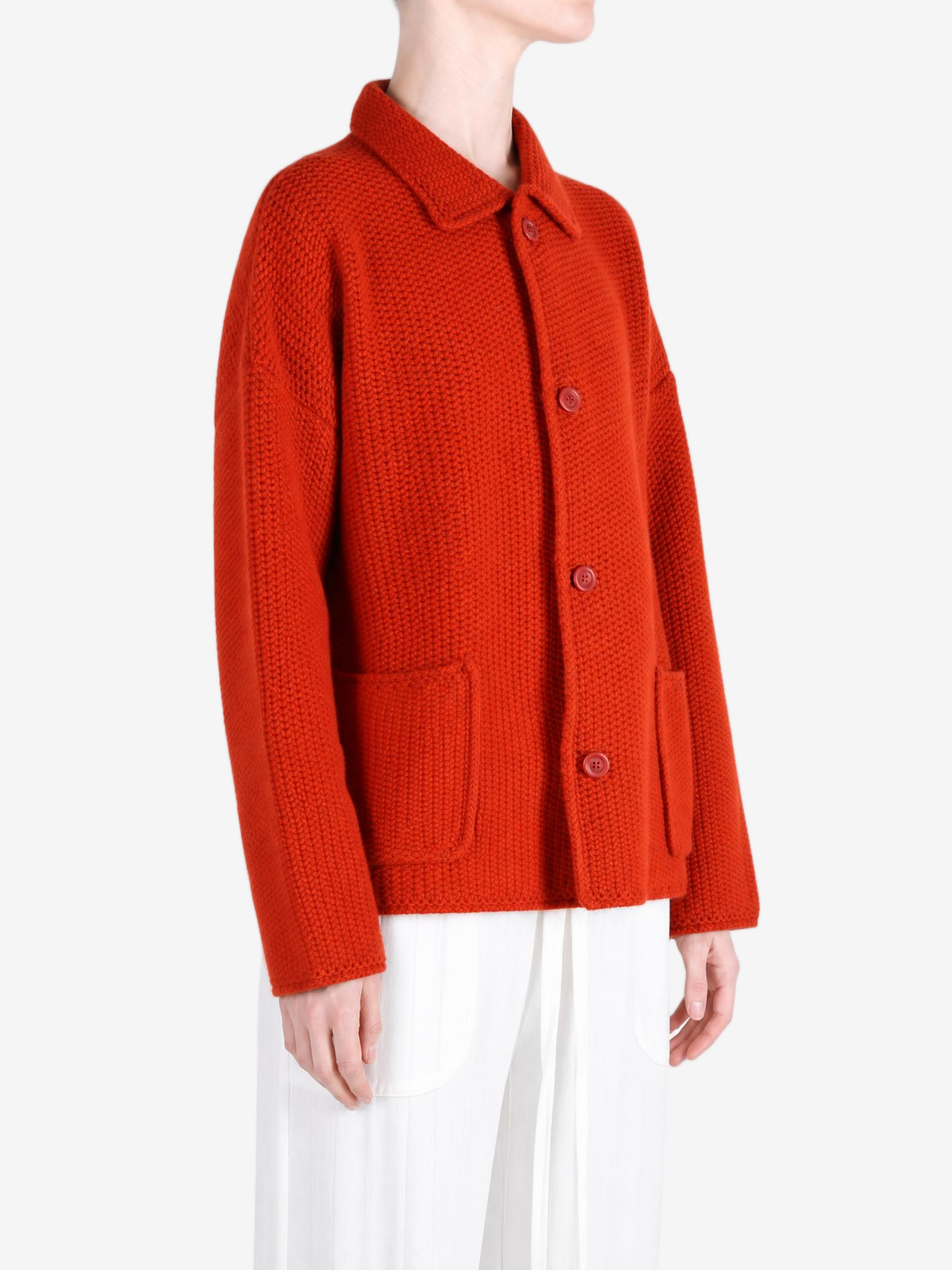 Red jacket worn by a person, showing the jacket fit
