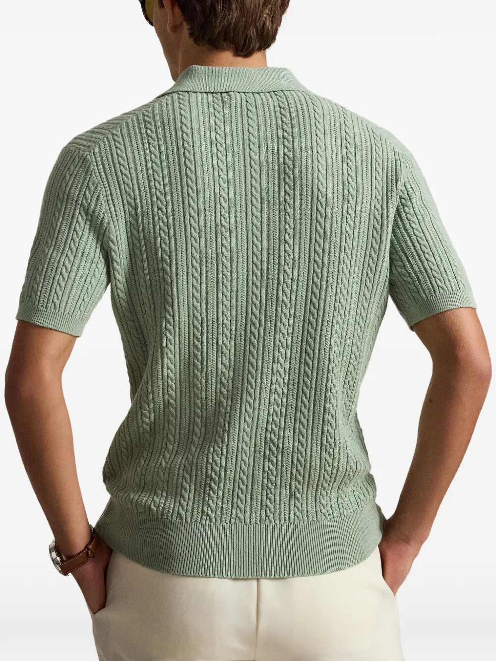Green shirt worn by a person, showing the shirt fit