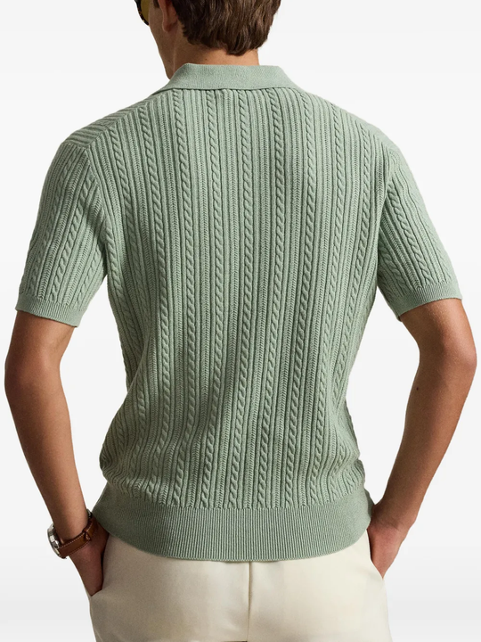 Green shirt worn by a person, showing the shirt fit