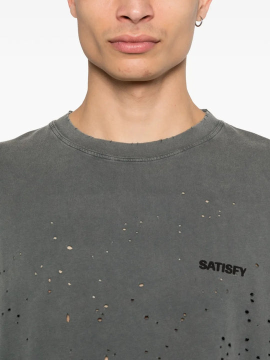 Close up of the black t-shirt, showing texture of the cotton fabric