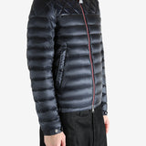 Black jacket worn by a person, showing the jacket fit