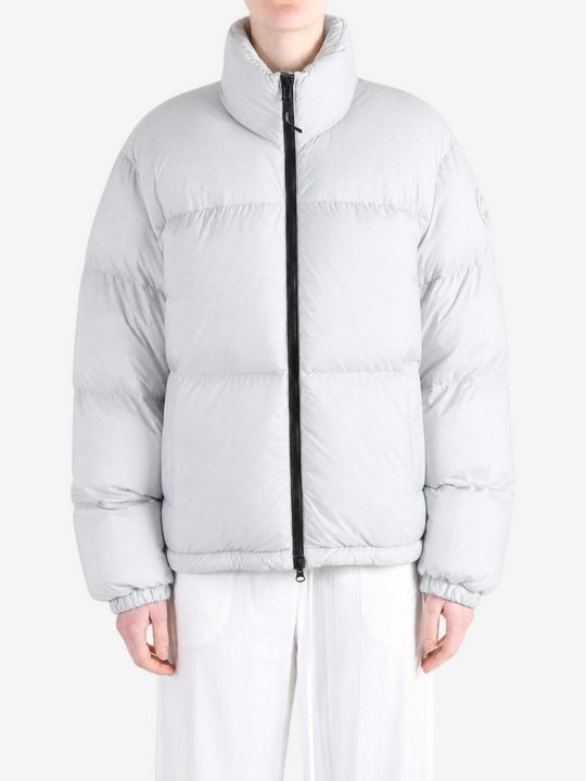 Grey jacket worn by a person, showing the jacket fit