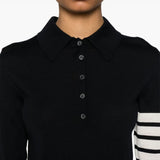 Black shirt worn by a person, showing the shirt fit