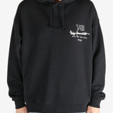 Black hoodie worn by a person, showing the hoodie's fit