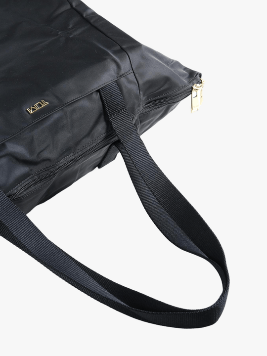 Close up of black bag, showing texture of the nylon fabric