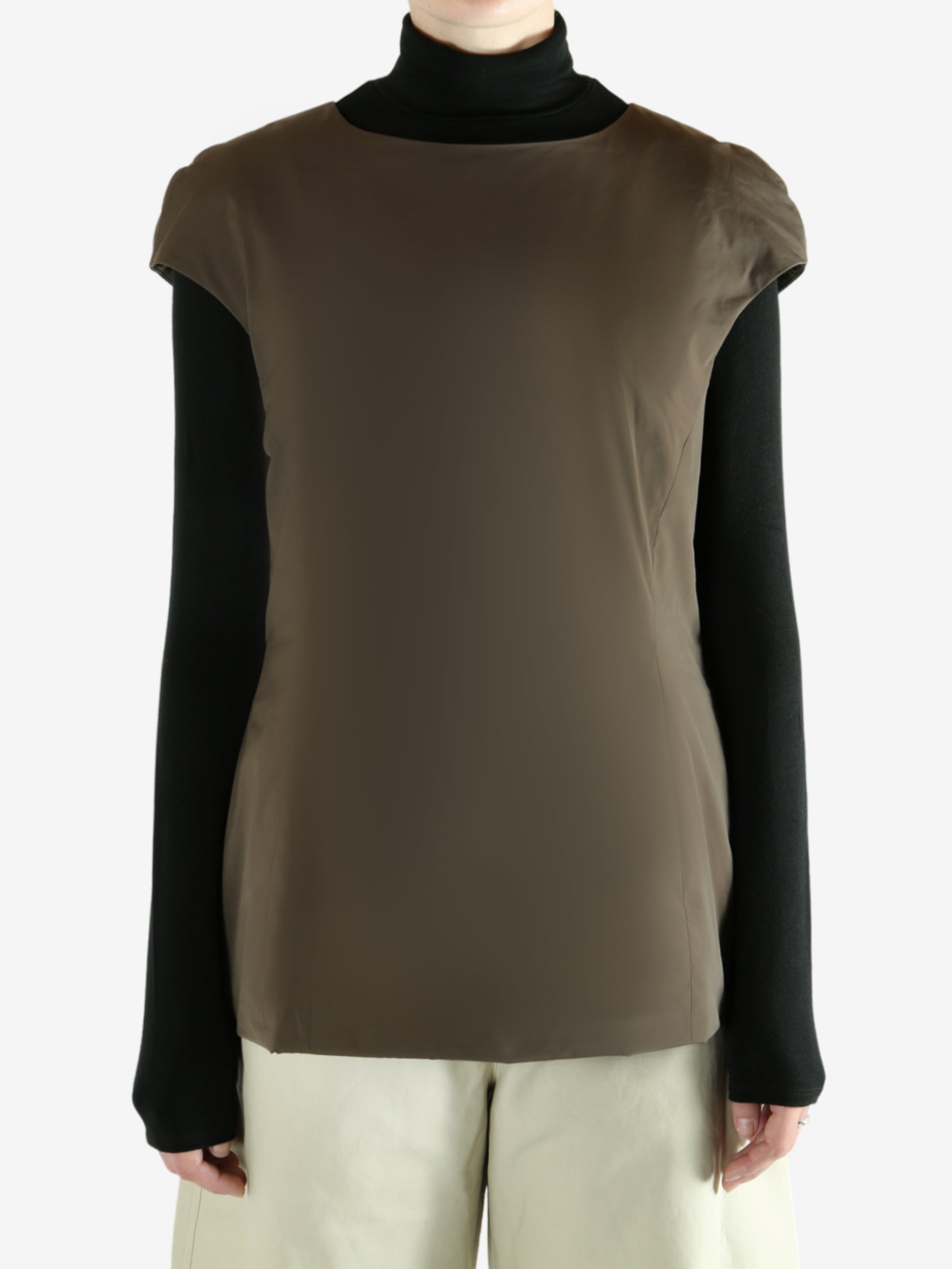 Brown dress worn by a person, showing  the dress's fit