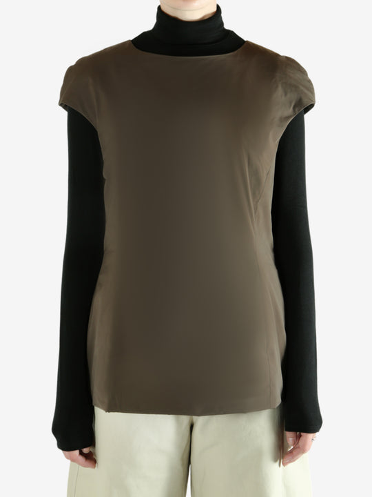 Brown dress worn by a person, showing  the dress's fit