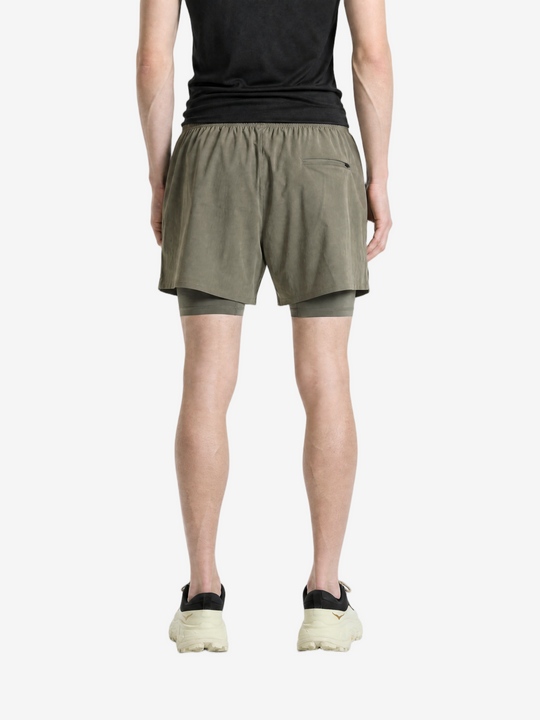 Green shorts, full body view