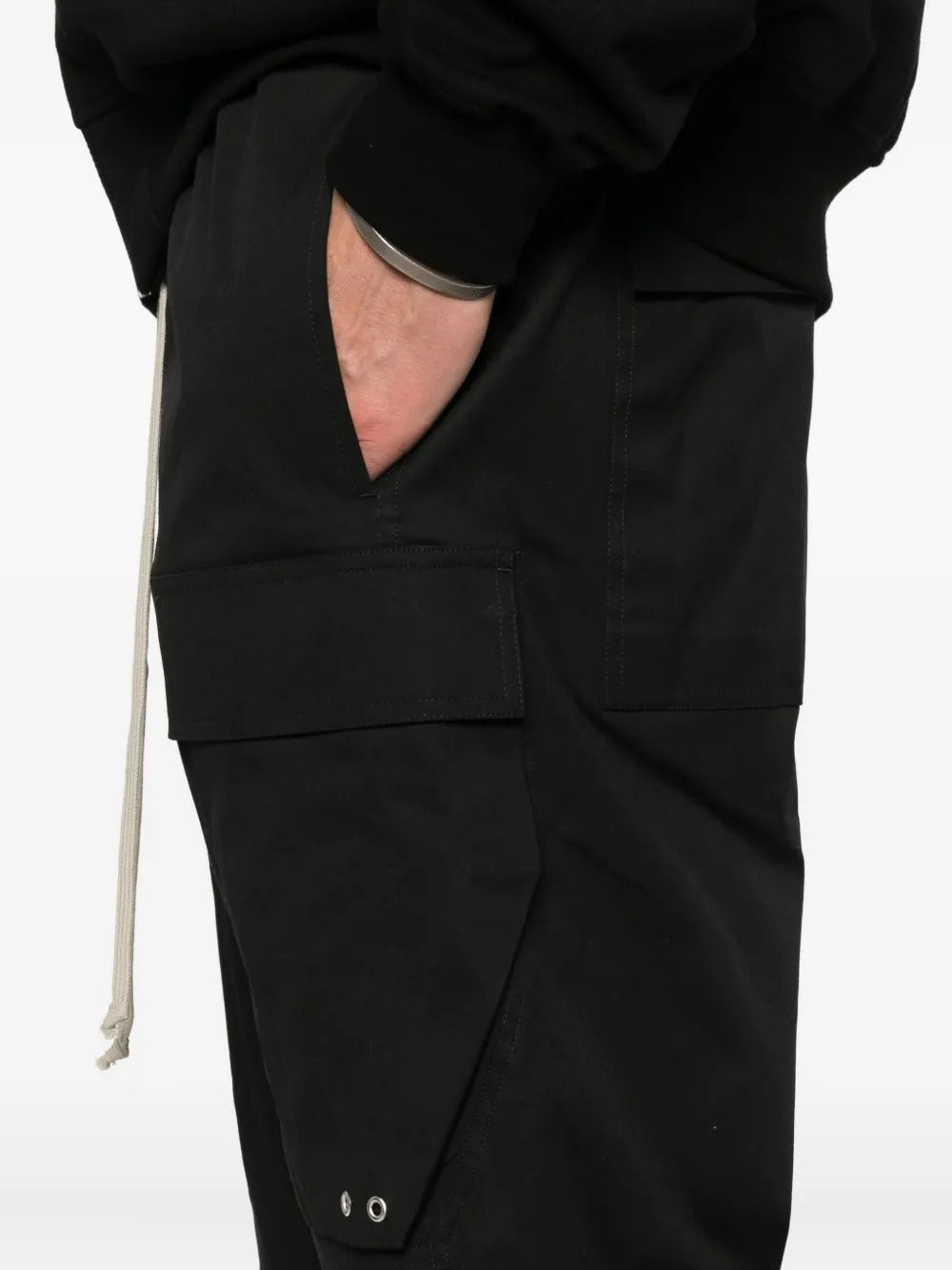 Close up of black short, showing the texture of the cotton fabric