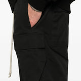 Close up of black short, showing the texture of the cotton fabric