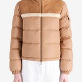 Brown jacket worn by a person, showing the jacket fit
