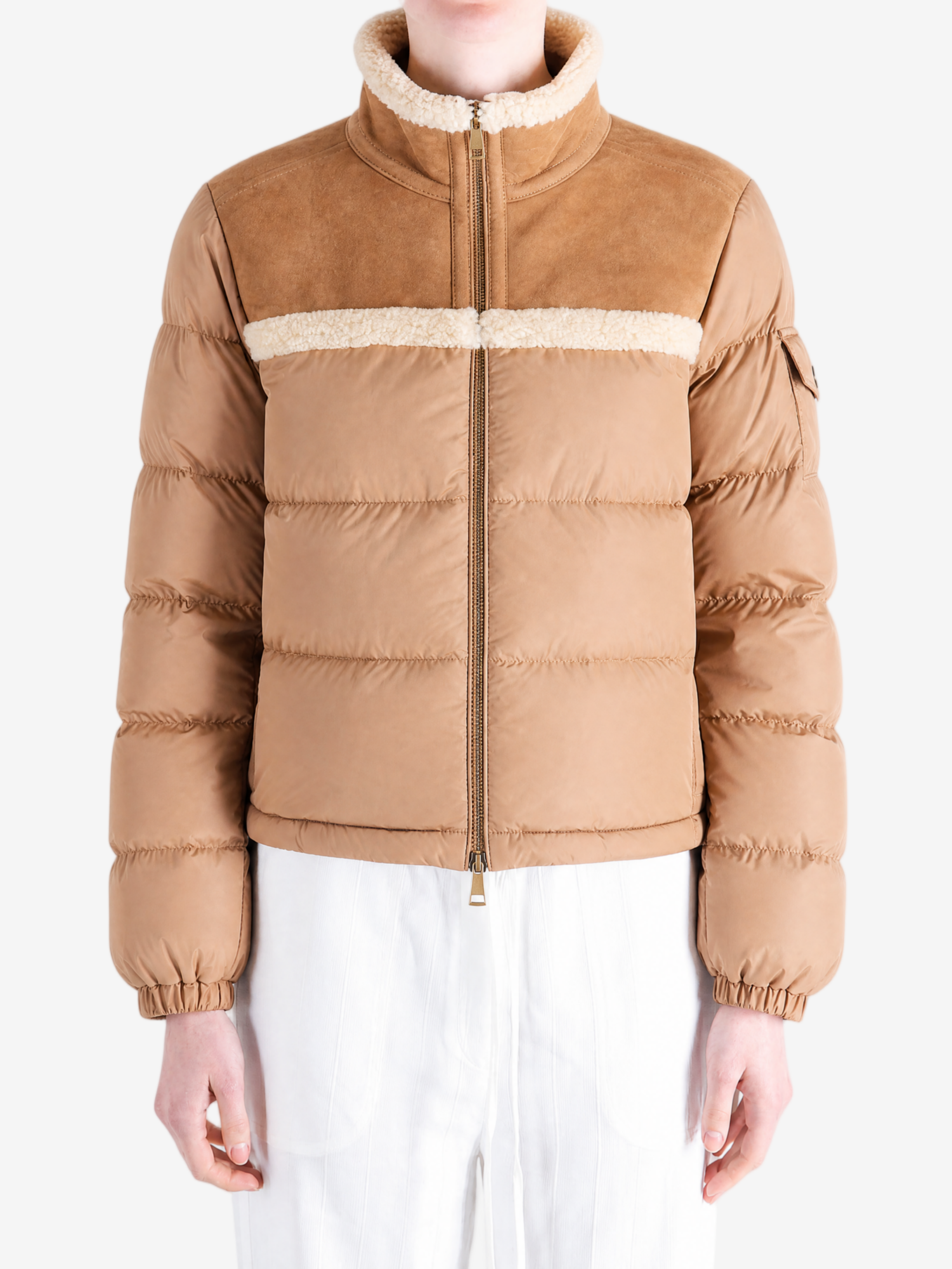 Brown jacket worn by a person, showing the jacket fit