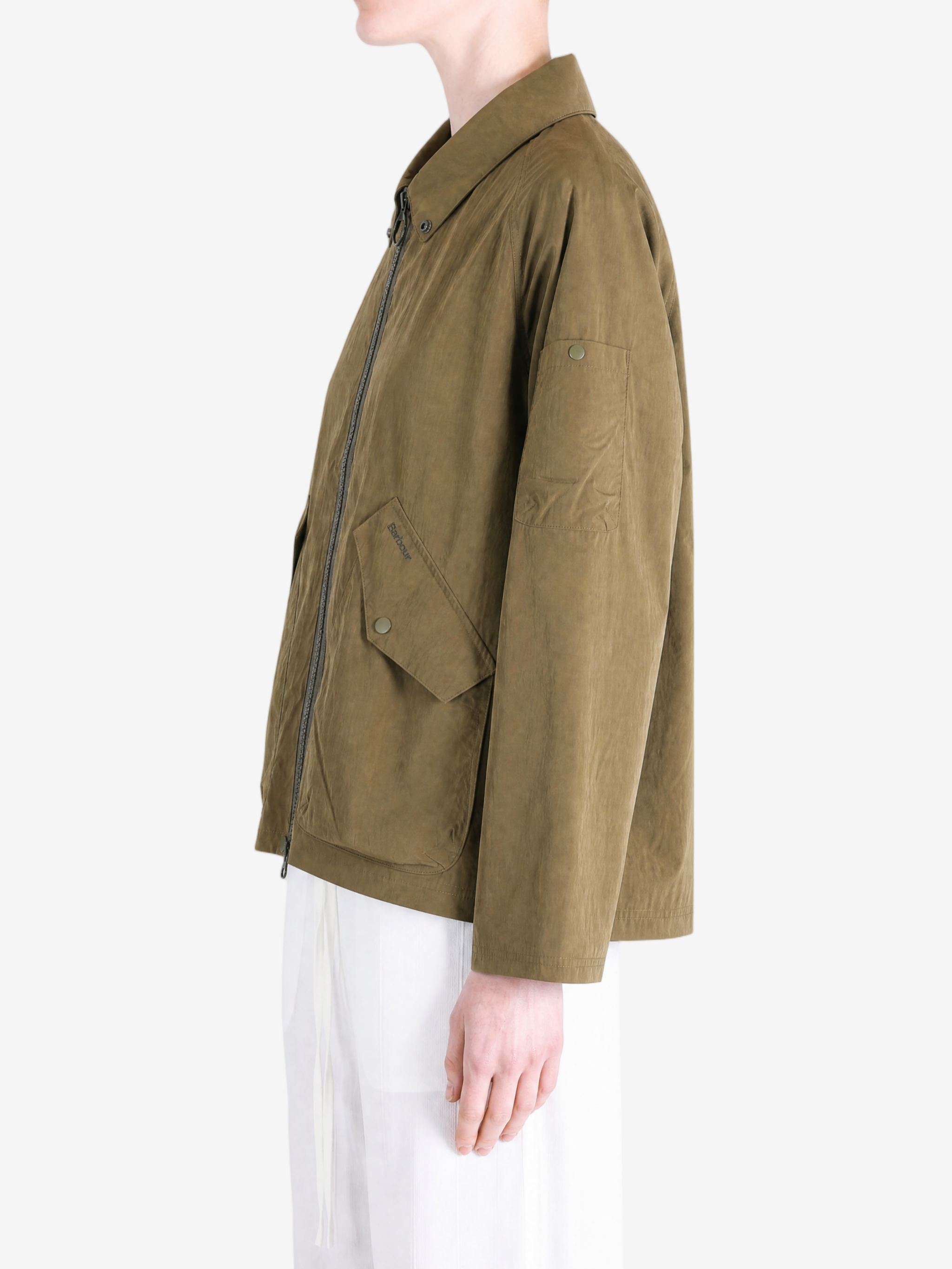 Brown jacket worn by a person, showing the jacket fit