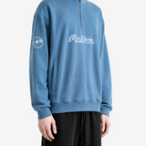 Blue hoodie worn by a person, showing the hoodie fit