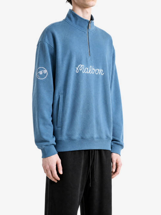 Blue hoodie worn by a person, showing the hoodie fit