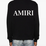 black sweat worn by a person, showing the sweat fit