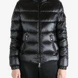 Black jackets-coats worn by a person, showing the jackets-coats fit