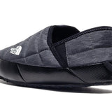 Close up of grey shoes, showing texture of the fabric