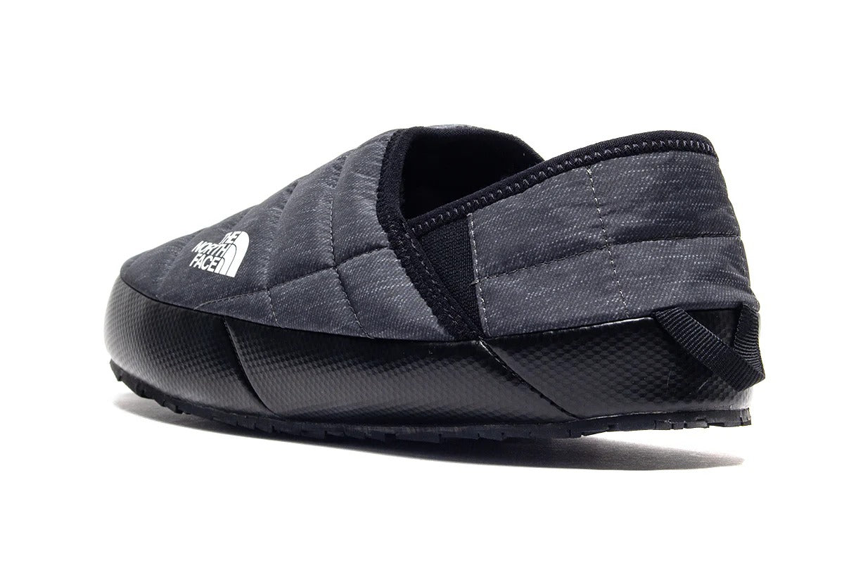 Close up of grey shoes, showing texture of the fabric