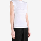 White top worn by a person, showing the top fit