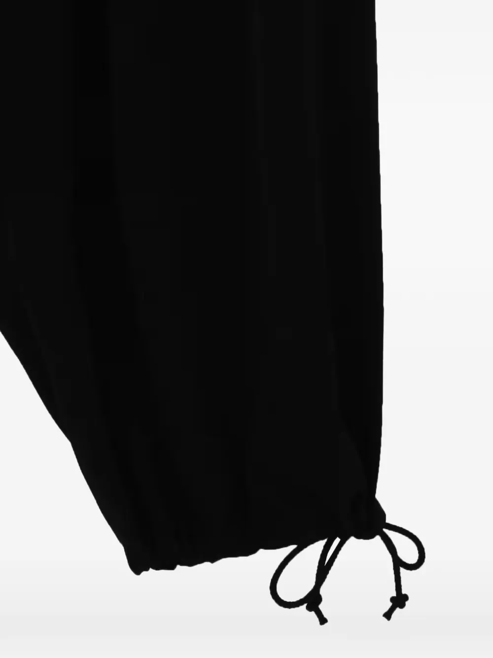 Close up of black pant, showing texture of the triacetate fabric
