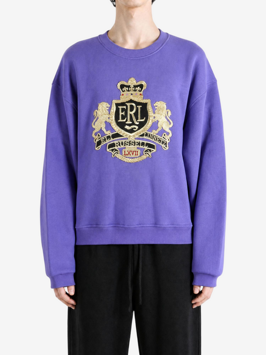 Purple top worn by a person, showing the top fit
