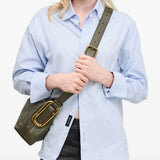 Green bag worn by a person, showing the bag fit