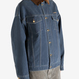 Blue jacket worn by a person, showing the jacket's fit