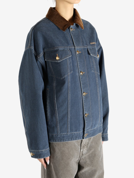 Blue jacket worn by a person, showing the jacket's fit