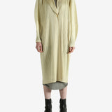 Yellow coat worn by a person, showing the coat's fit