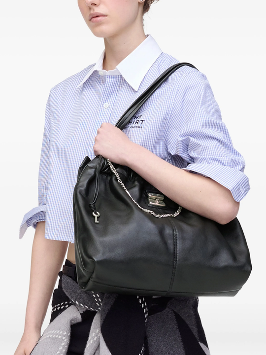 Black bag worn by a person, showing the bag's fit