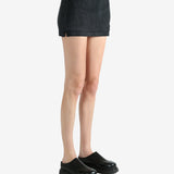 Black skirt worn by a person, showing the skirt's fit