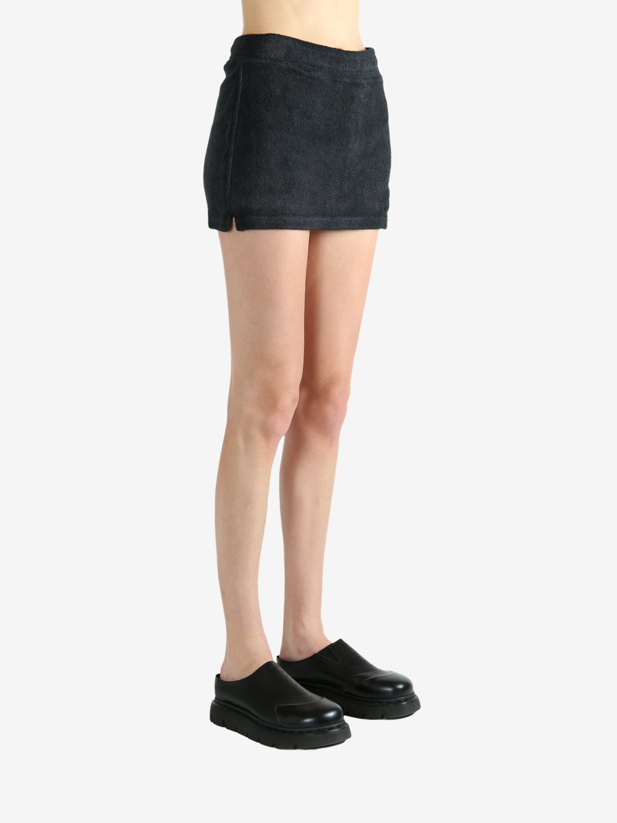 Black skirt worn by a person, showing the skirt's fit